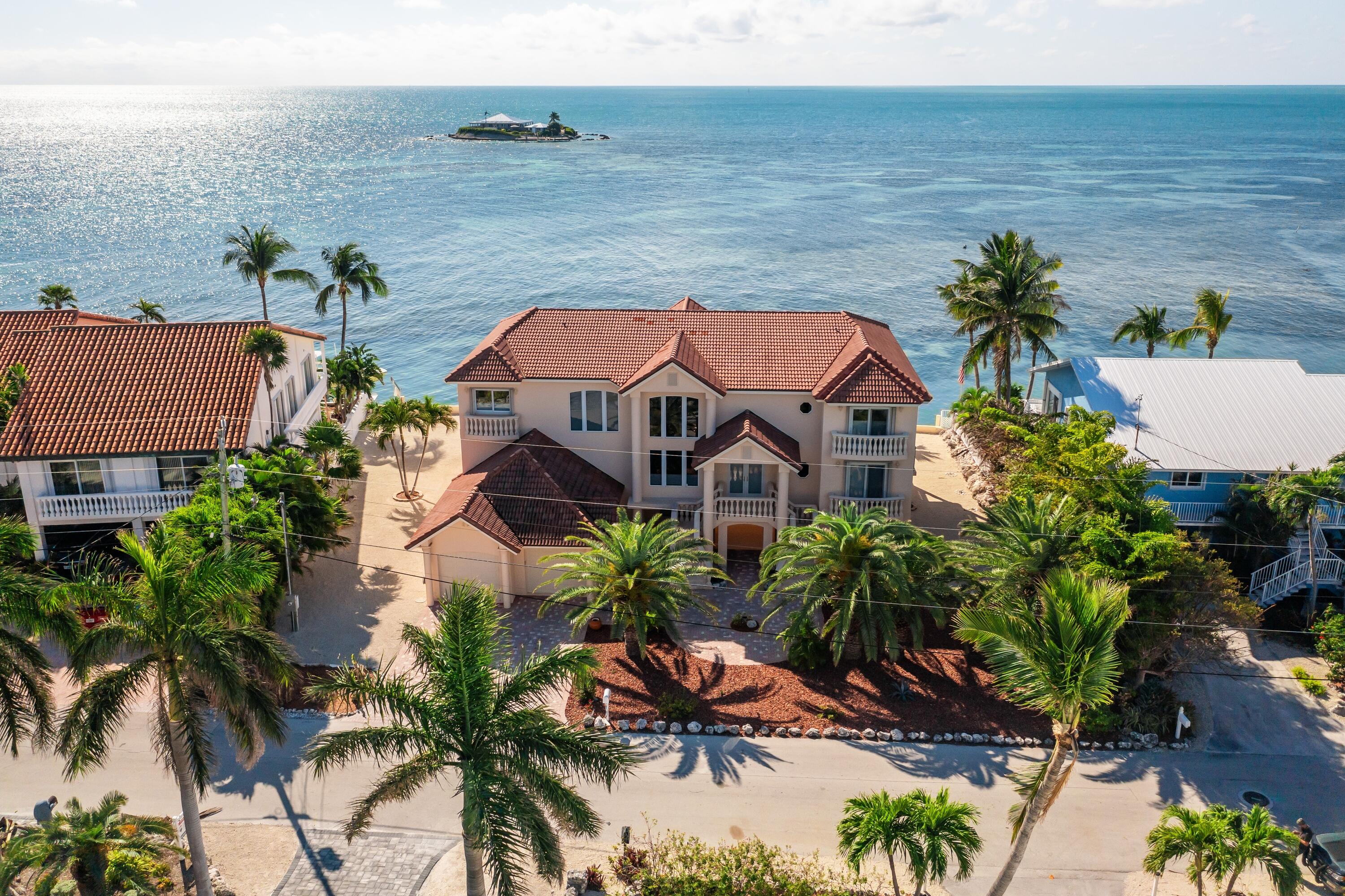5 Ocean Drive East Marathon, FL 33050 - Photo 79 of 79 an aerial view of a house with a yard