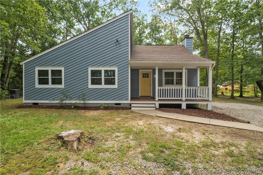 10911 Berrand Road North Chesterfield, VA 23236 - Photo 1 of 44 a view of a house with a yard and sitting area