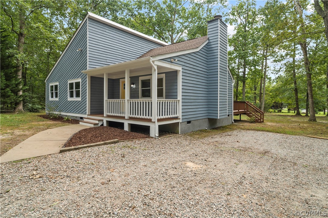 10911 Berrand Road North Chesterfield, VA 23236 - Photo 2 of 44 a view of a house with a yard