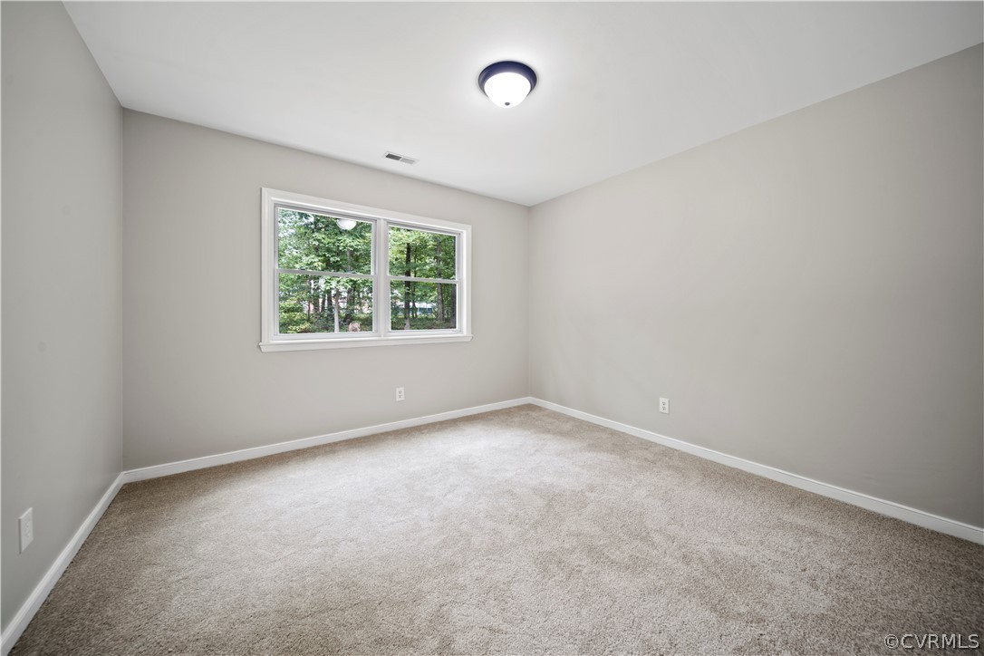10911 Berrand Road North Chesterfield, VA 23236 - Photo 27 of 44 an empty room with a window
