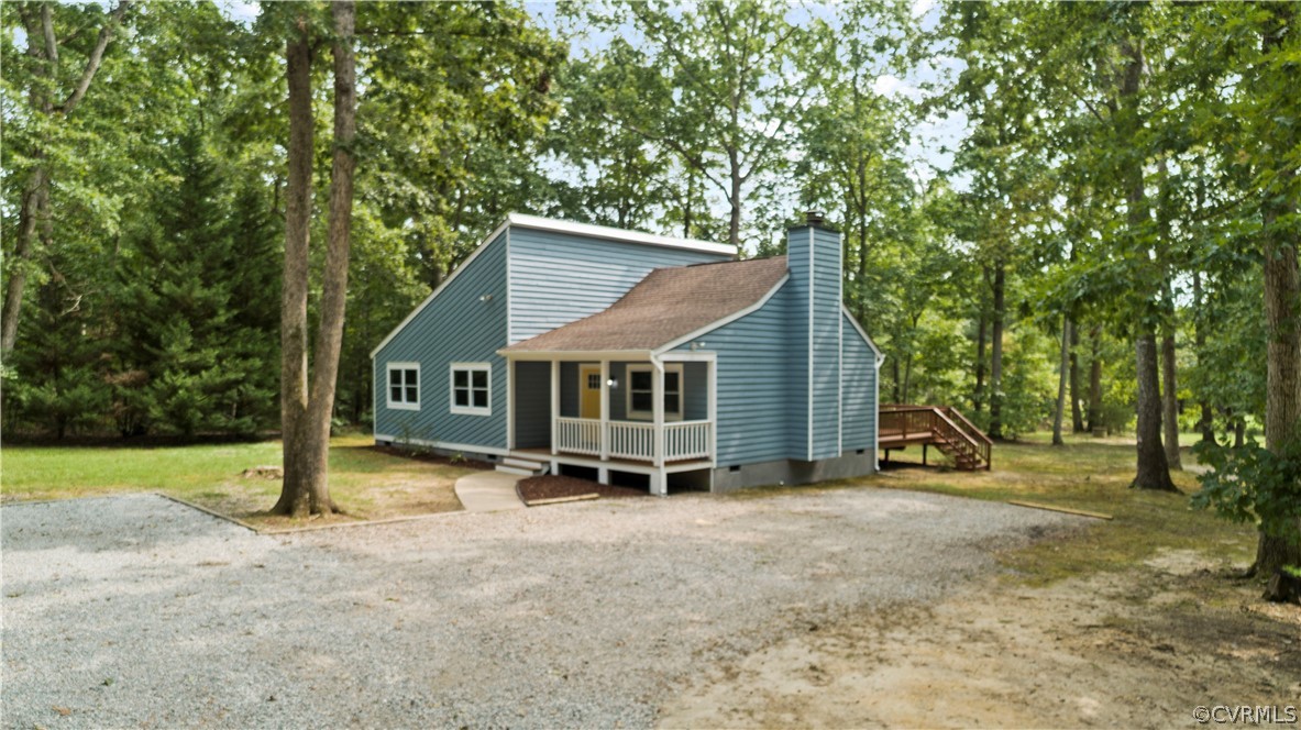 10911 Berrand Road North Chesterfield, VA 23236 - Photo 3 of 44 a view of a house with backyard and trees