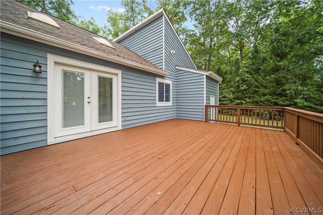 10911 Berrand Road North Chesterfield, VA 23236 - Photo 34 of 44 a view of a house with wooden deck
