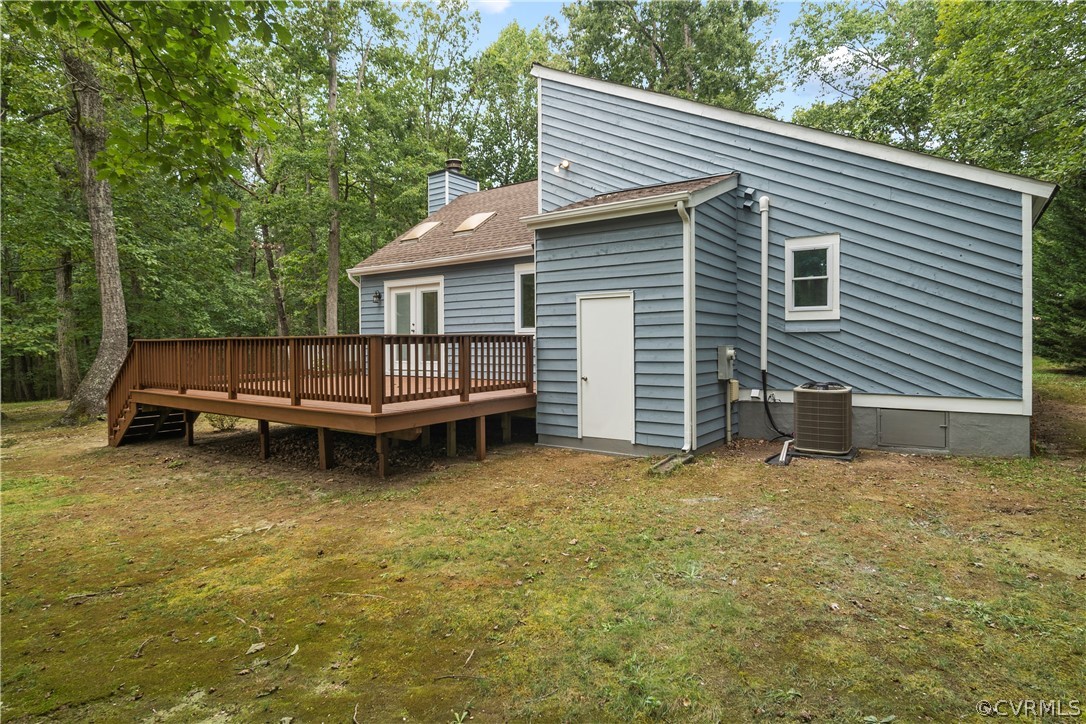 10911 Berrand Road North Chesterfield, VA 23236 - Photo 35 of 44 a backyard of a house with barbeque oven and yard