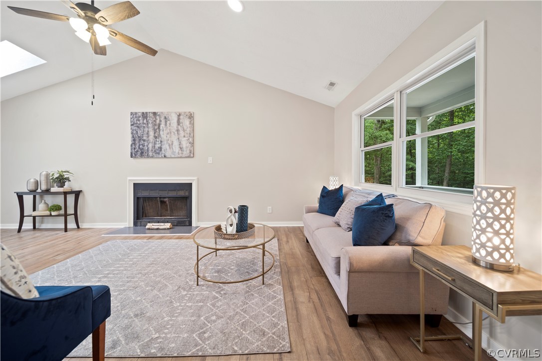 10911 Berrand Road North Chesterfield, VA 23236 - Photo 7 of 44 a living room with furniture and a fireplace
