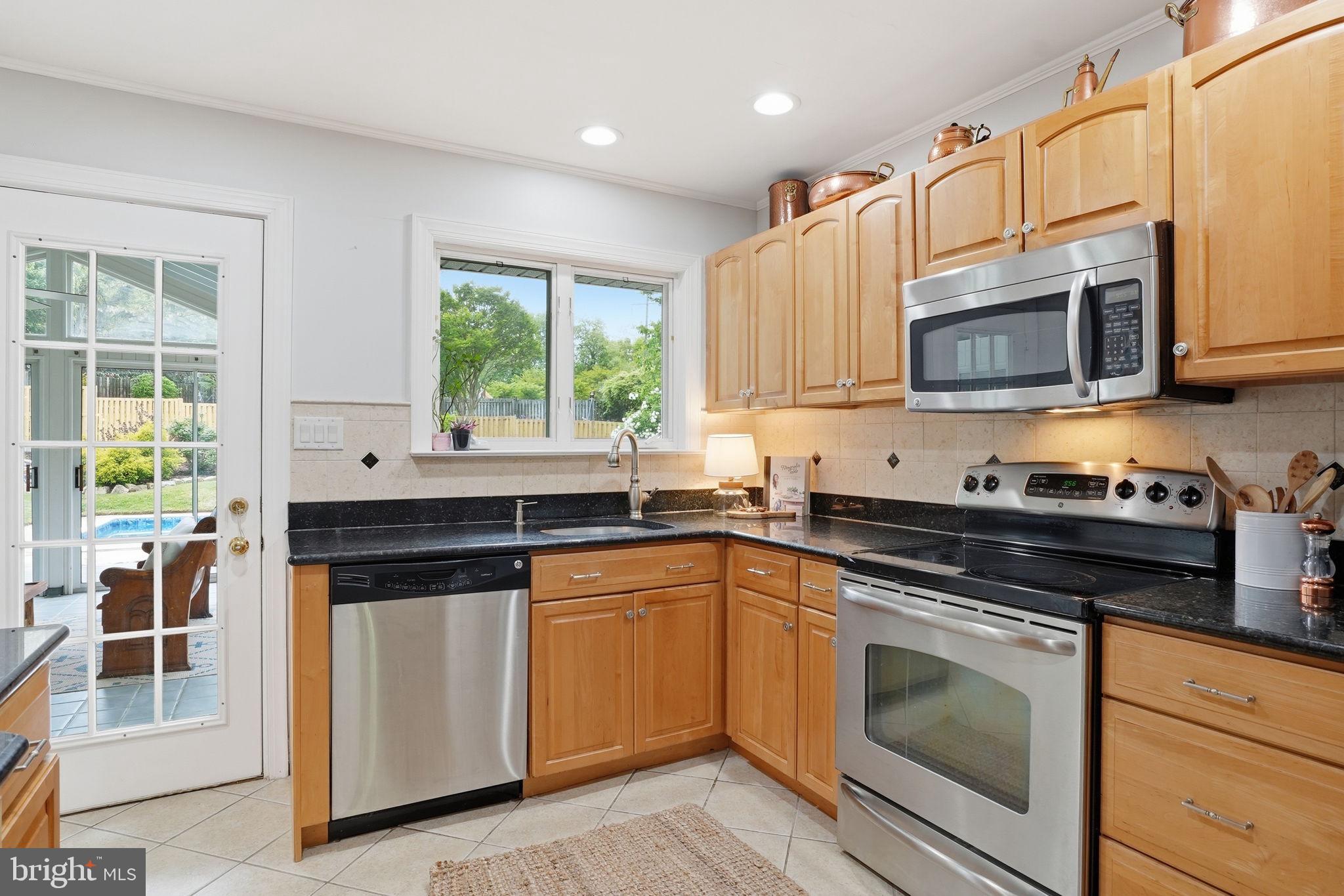 1609 Cedar Park Road Annapolis, MD 21401 - Photo 17 of 43 Granite countertops and stainless steel appl.