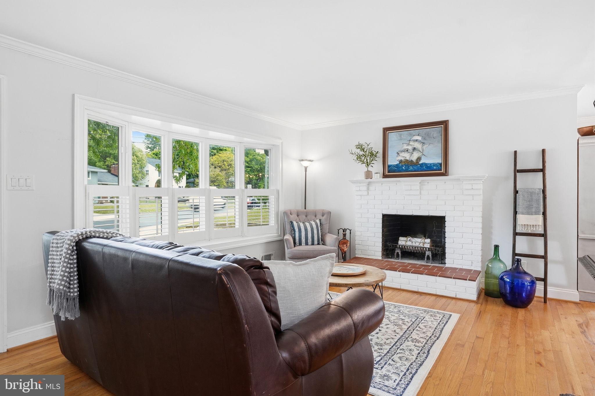 1609 Cedar Park Road Annapolis, MD 21401 - Photo 4 of 43 Family room anchored by FP and lit by bay window