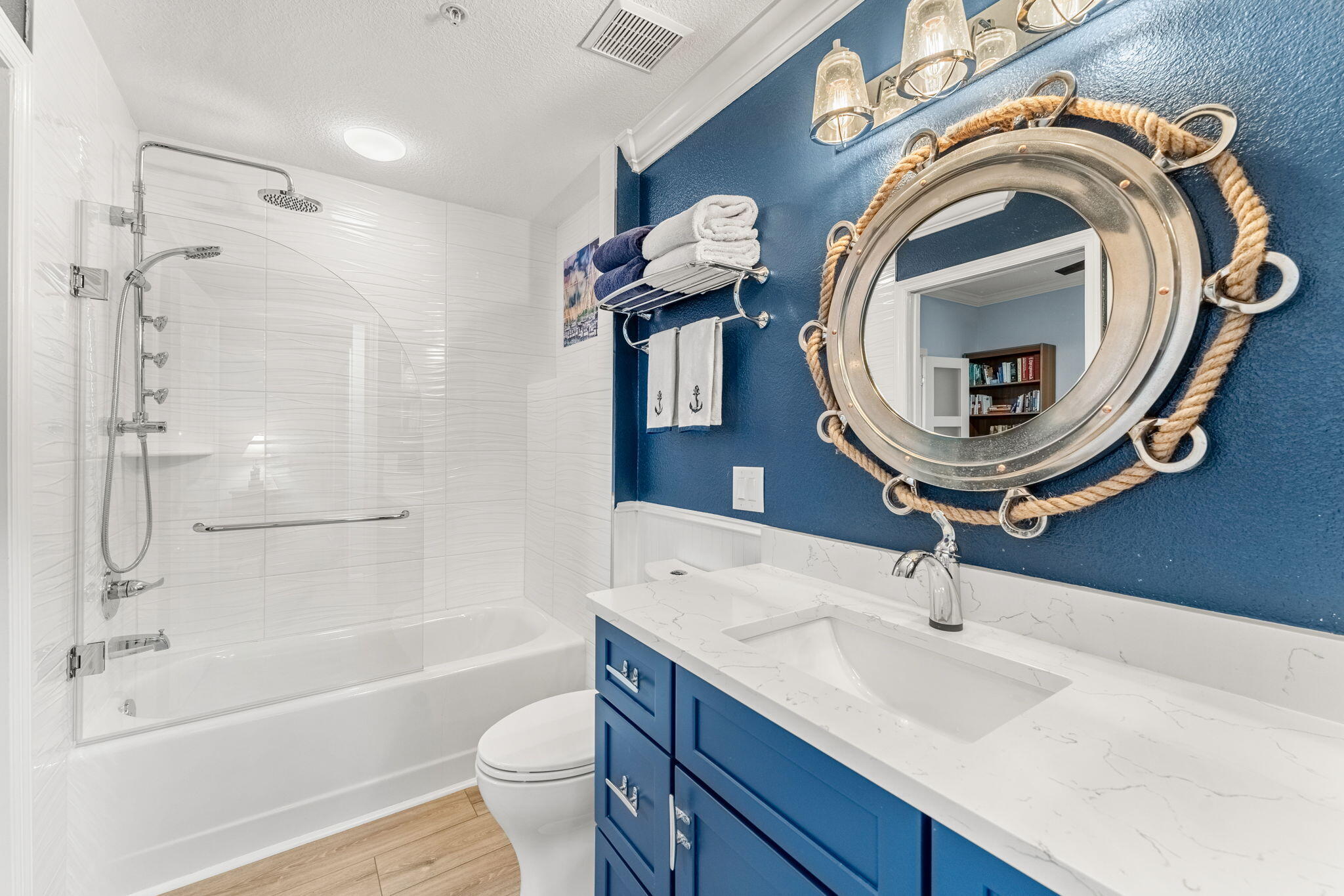104 Riverside Drive, Unit 903 Cocoa, FL 32922 - Photo 33 of 90 Jack & Jill bath with Nautical Design