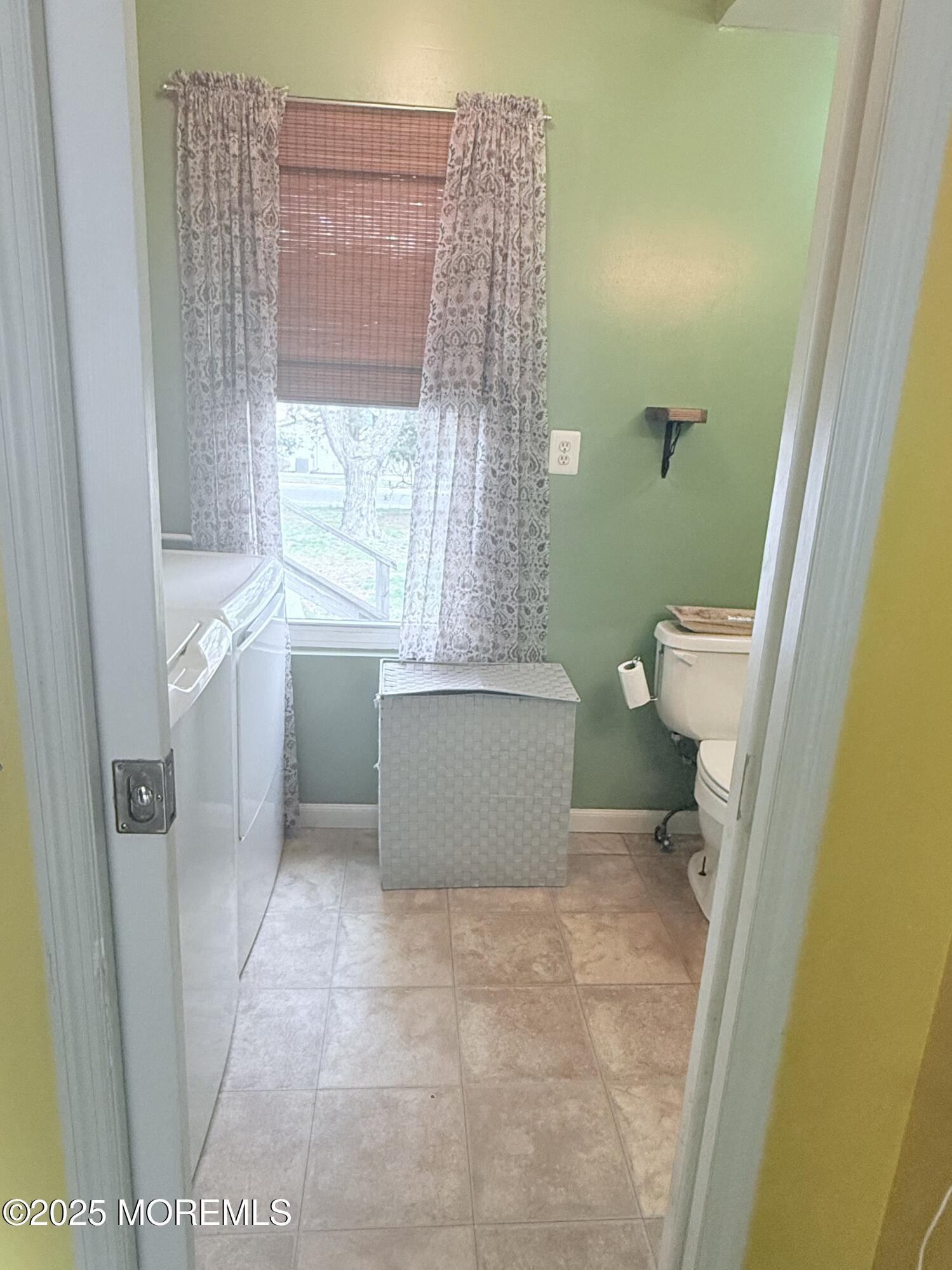 479 Line Road Matawan, NJ 07747 - Photo 20 of 32 a bathroom with a sink a toilet a tub and shower