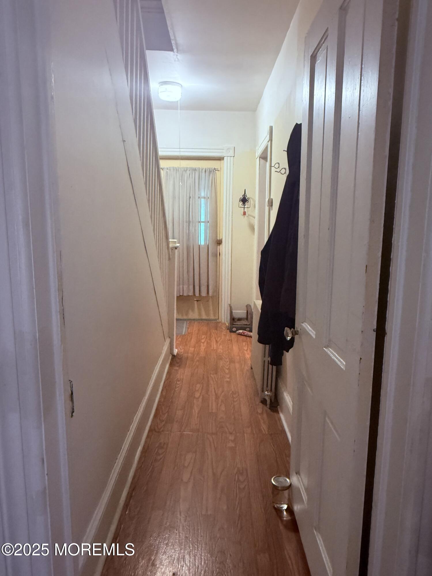 479 Line Road Matawan, NJ 07747 - Photo 24 of 32 a view of a hall with wooden floor