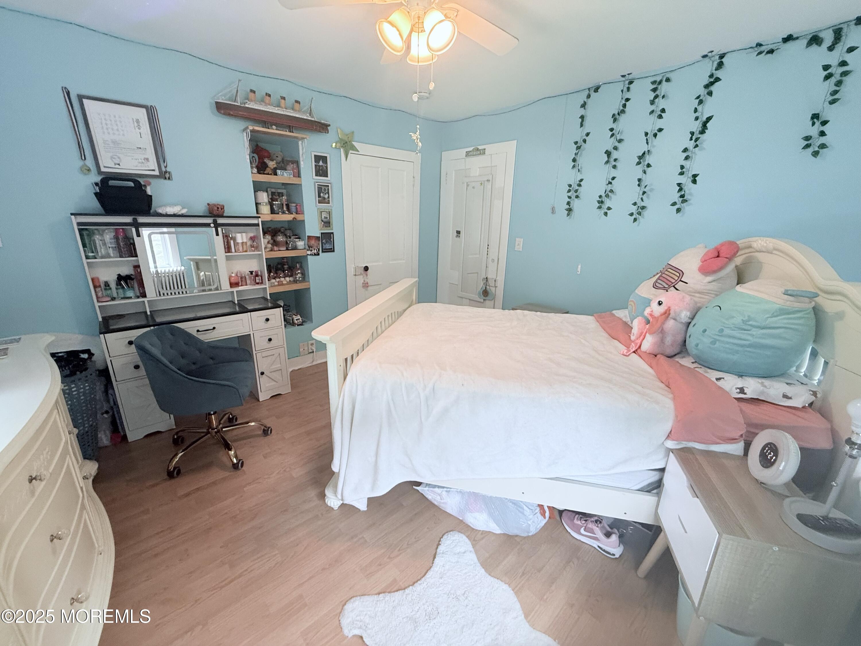 479 Line Road Matawan, NJ 07747 - Photo 27 of 32 a bedroom with a bed and cabinets