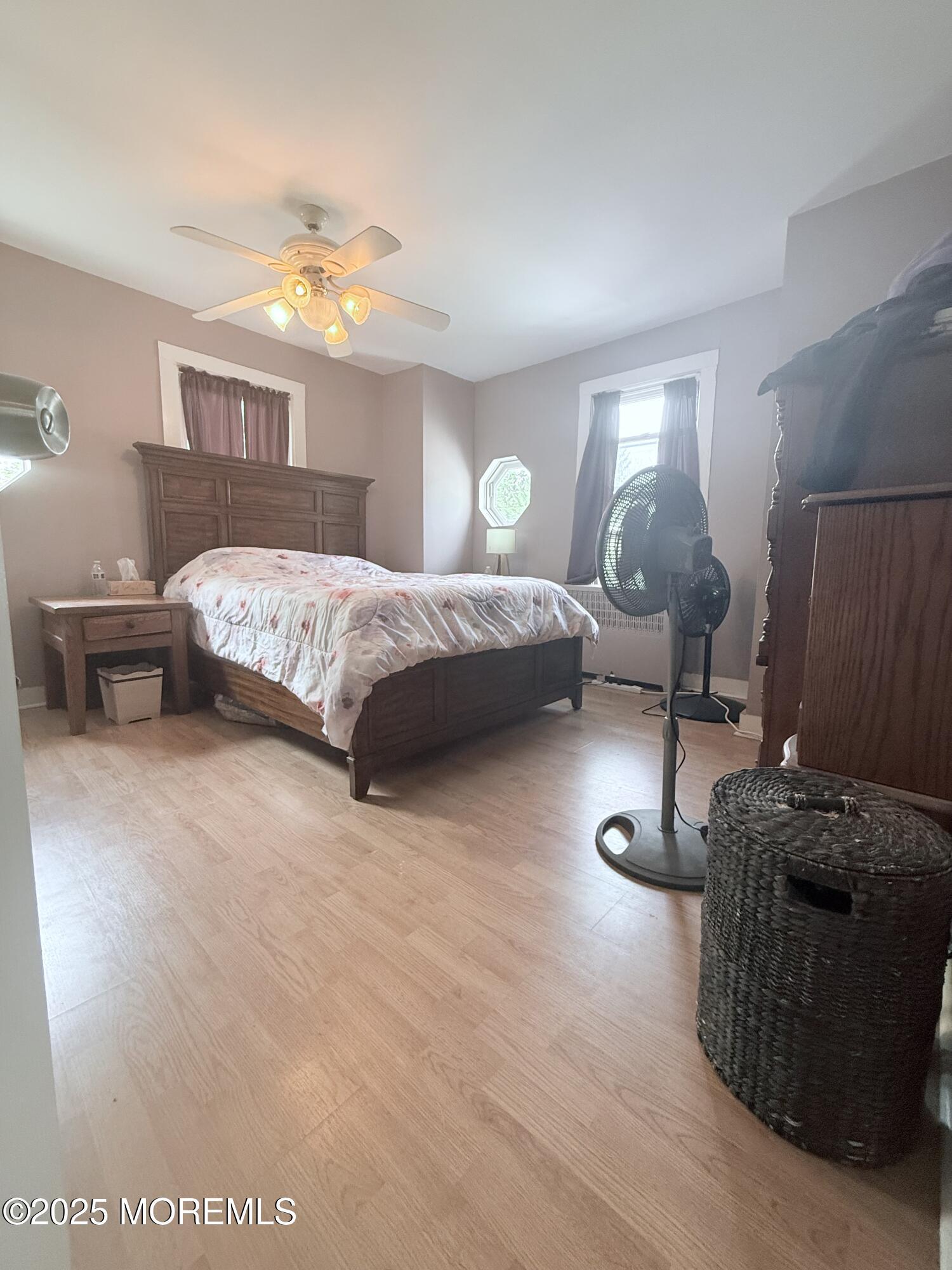 479 Line Road Matawan, NJ 07747 - Photo 28 of 32 a bedroom with a bed and a night stand