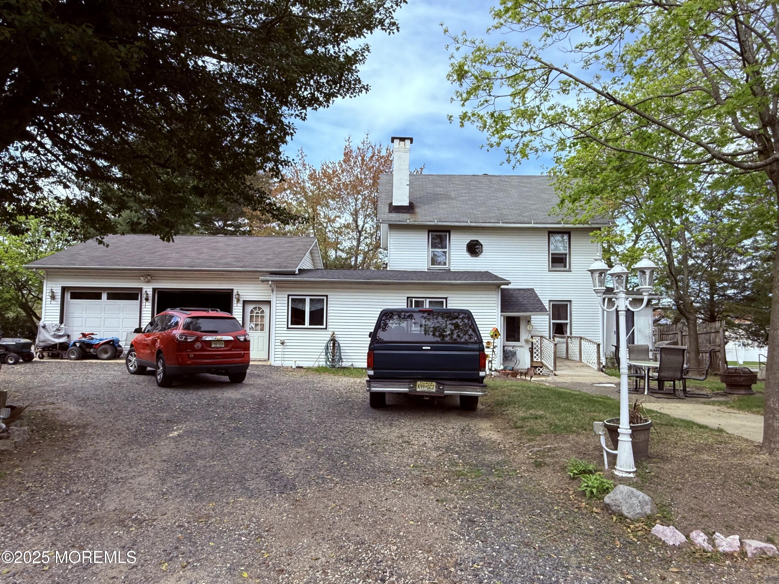 479 Line Road Matawan, NJ 07747 - Photo 8 of 32 a car parked in front of a house