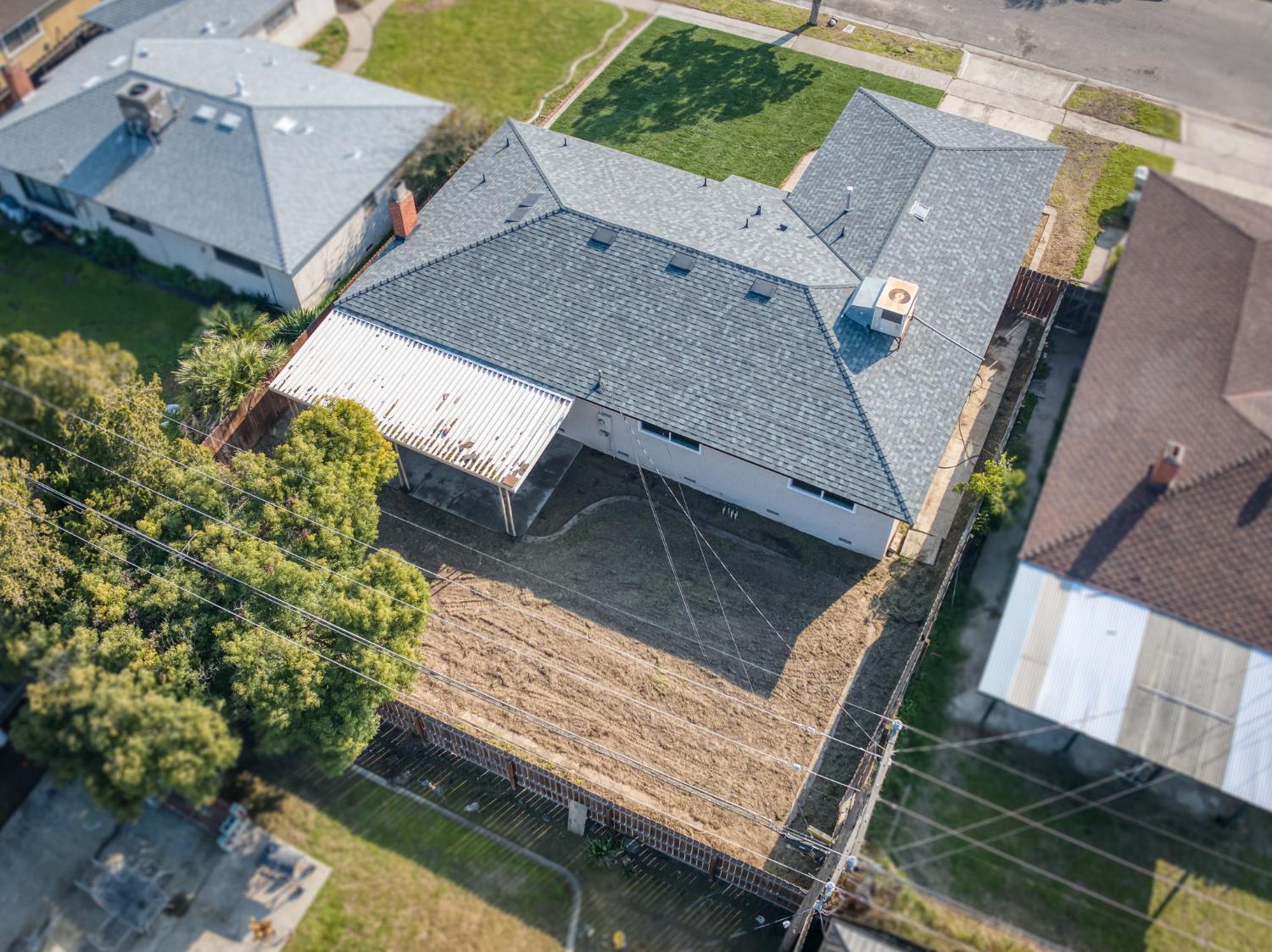 4031 East Pontiac Way Fresno, CA 93726 - Photo 40 of 46 an aerial view of house with yard