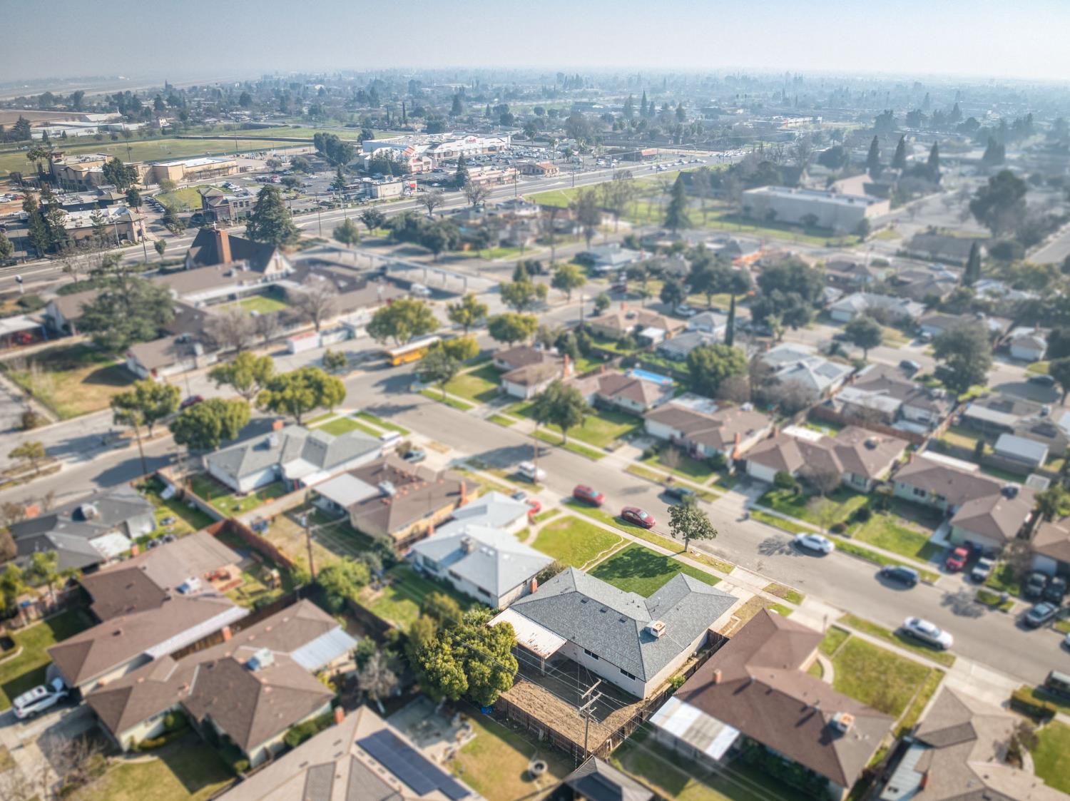 4031 East Pontiac Way Fresno, CA 93726 - Photo 42 of 46 an aerial view of residential houses with outdoor space