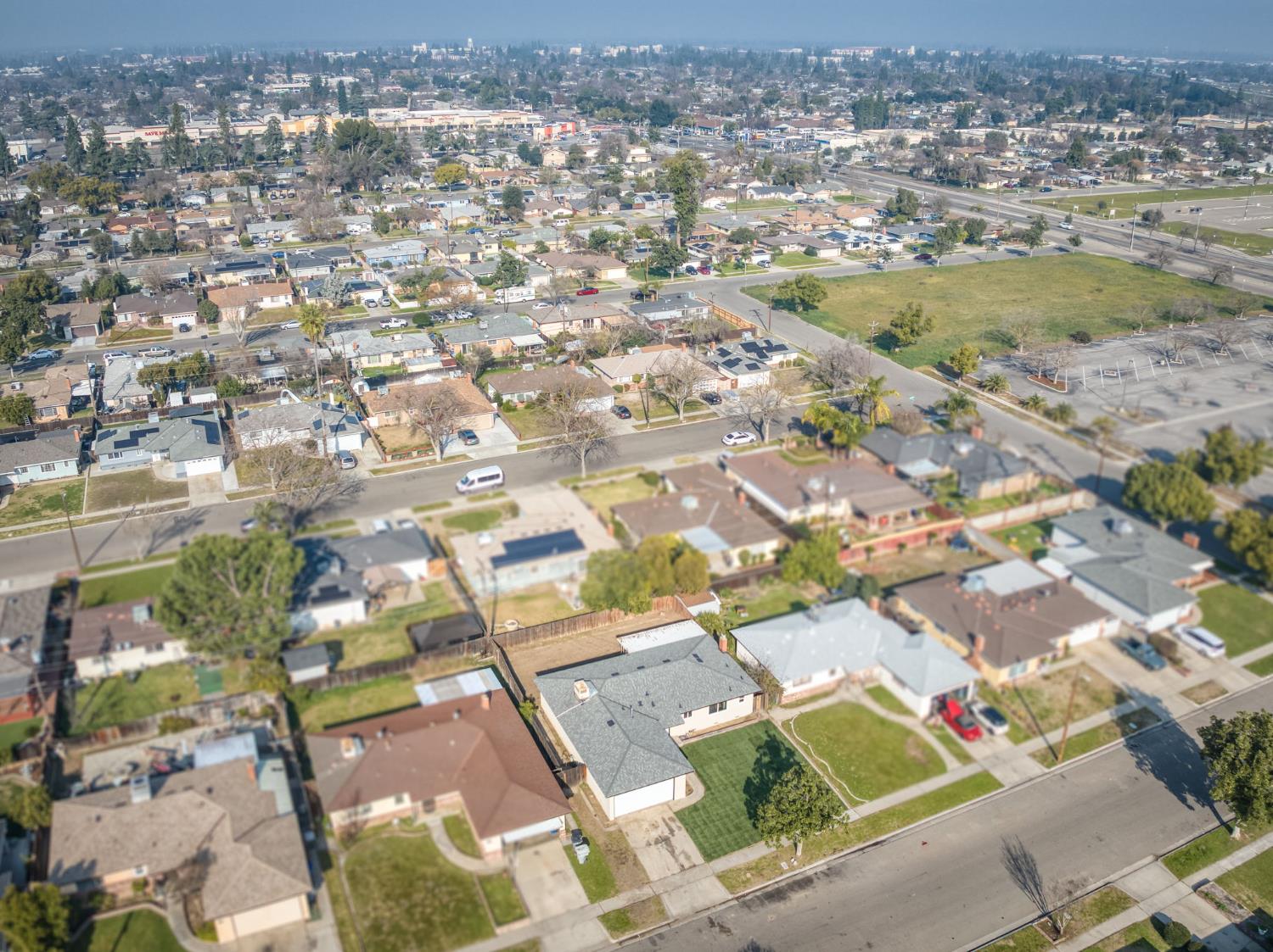 4031 East Pontiac Way Fresno, CA 93726 - Photo 43 of 46 an aerial view of residential houses with outdoor space