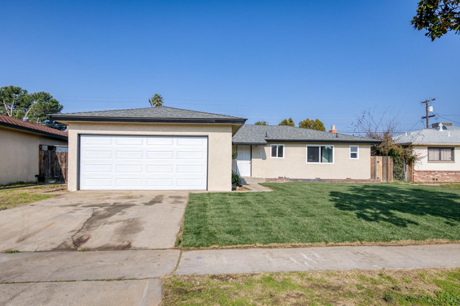 4031 East Pontiac Way Fresno, CA 93726 - Photo 5 of 46 a view of a house with a patio