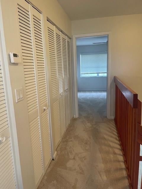 6373 Boca Circle Boca Raton, FL 33433 - Photo 16 of 22 a view of hallway with stairs and a window