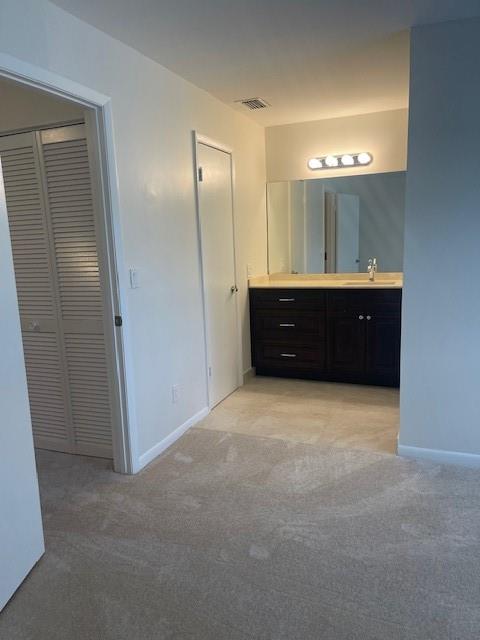 6373 Boca Circle Boca Raton, FL 33433 - Photo 18 of 22 a bathroom with a sink vanity and a mirror