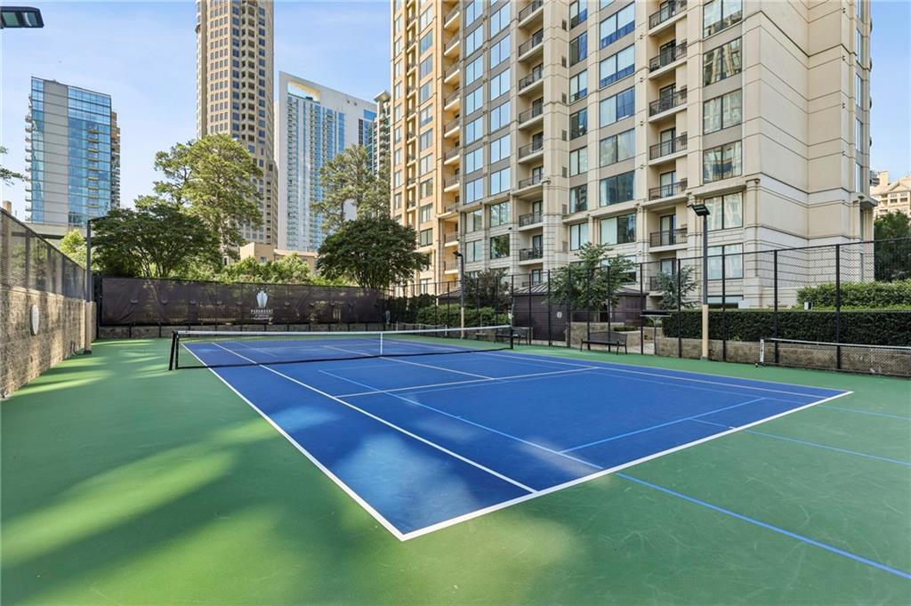 3445 Stratford Road Northeast, Unit 3105 Atlanta, GA 30326 - Photo 34 of 47 a view of a tennis court