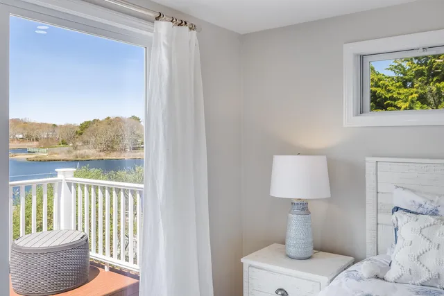 a bathroom with a double vanity sink mirror and