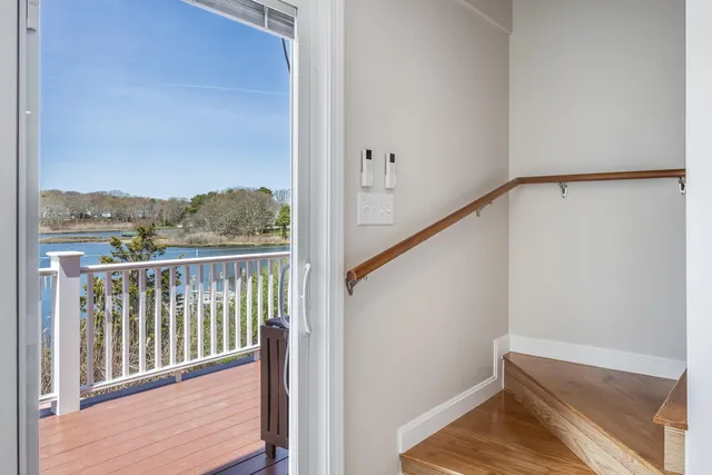 a bathroom with a double vanity sink mirror and toilet
