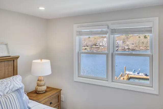 a room with wooden floor and cabinet