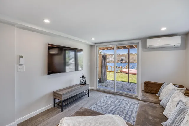 a picture of a bench in front of a wall