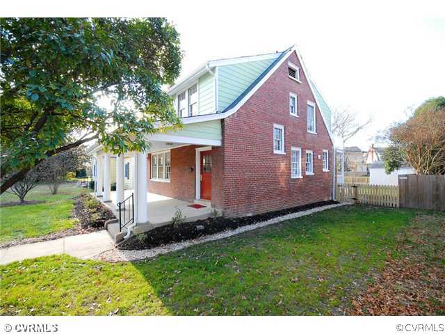 3808 Brook Road Richmond, VA 23227 - Photo 3 of 24 a front view of a house with garden