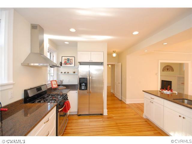 3808 Brook Road Richmond, VA 23227 - Photo 7 of 24 a kitchen with stainless steel appliances granite countertop a refrigerator a stove and a sink