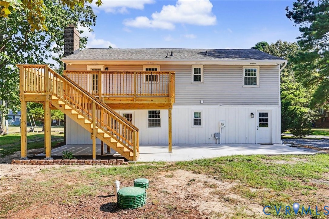 9737 Graves Road Petersburg, VA 23803 - Photo 37 of 41 Multi-level exterior with a wooden deck and stairc