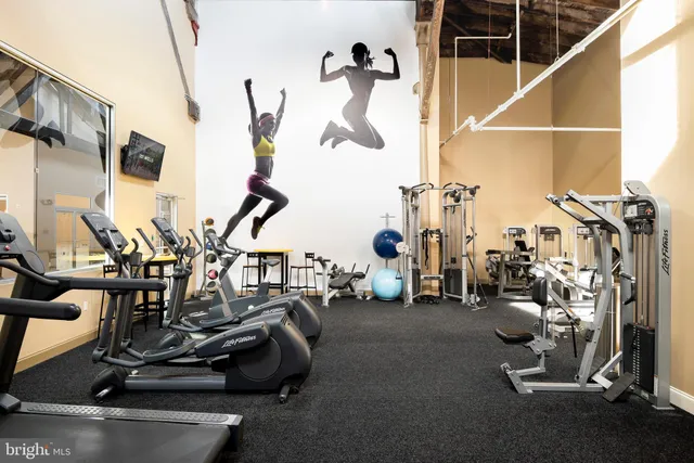 a view of a room with gym equipment