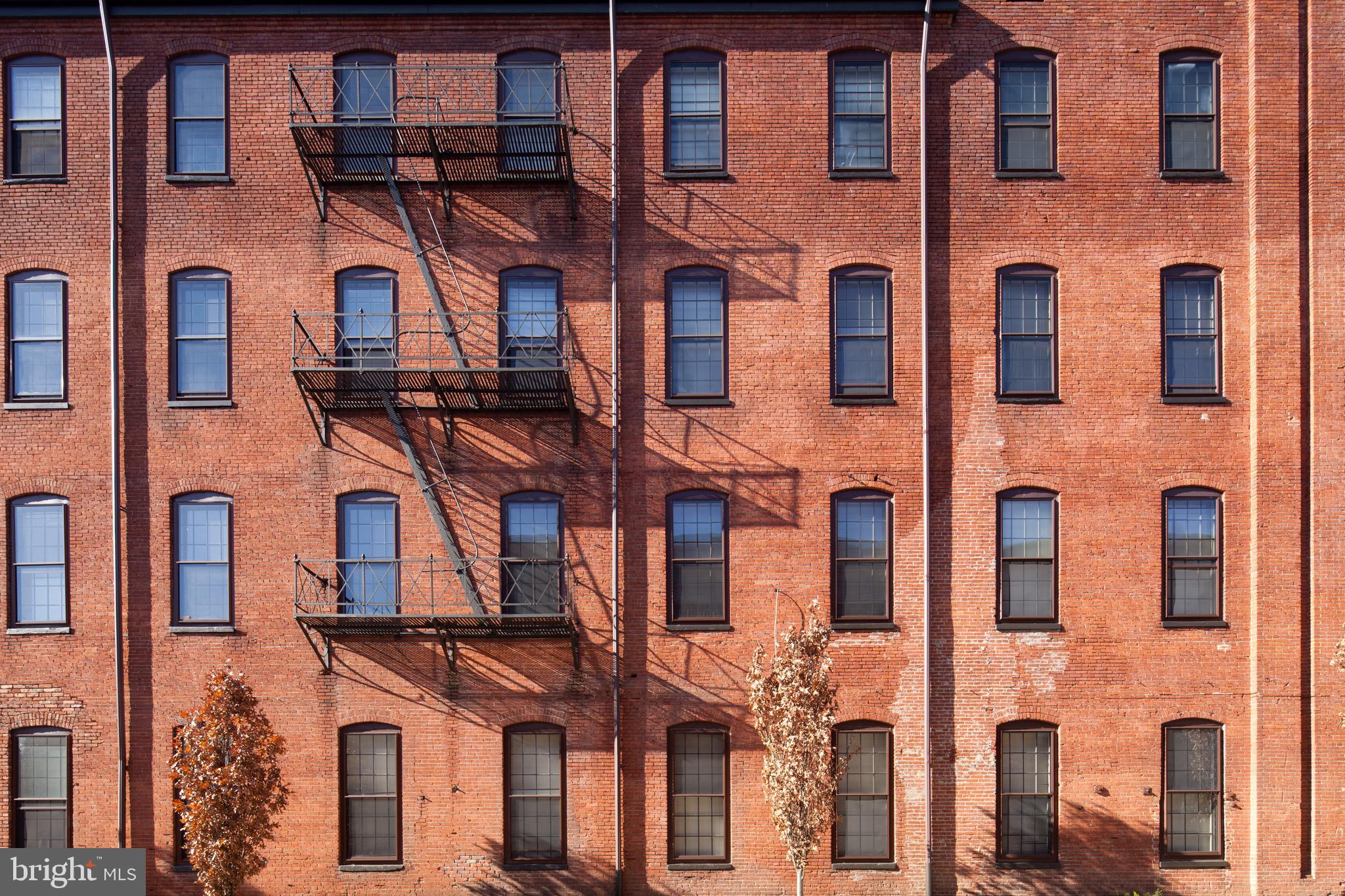 101 Wells Baltimore Md 21230, Unit 2BR Baltimore, MD 21230 - Photo 9 of 46 front view of a building
