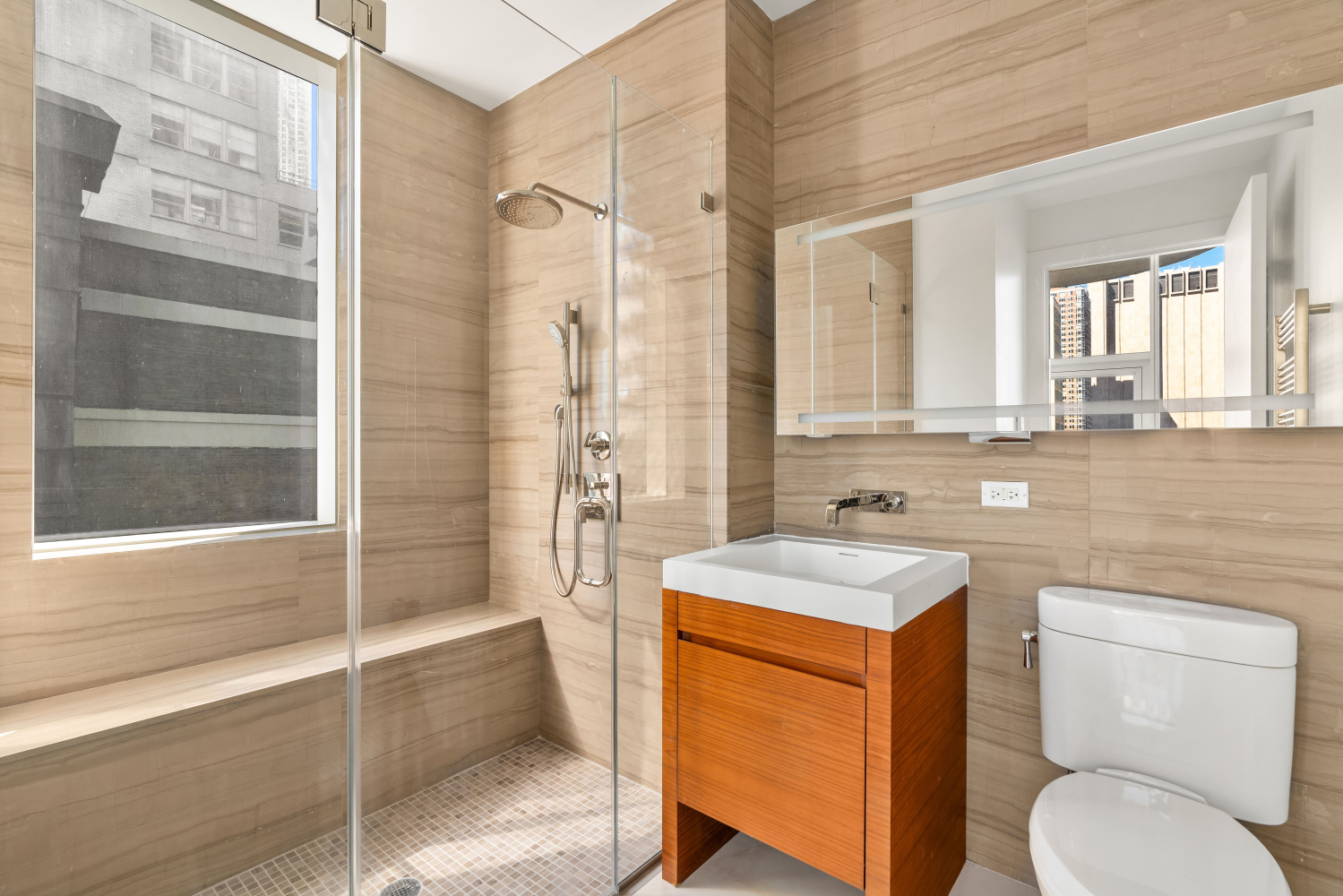 19 Park Place, Unit PH Manhattan, NY 10007 - Photo 11 of 17 a bathroom with a sink toilet vanity and shower