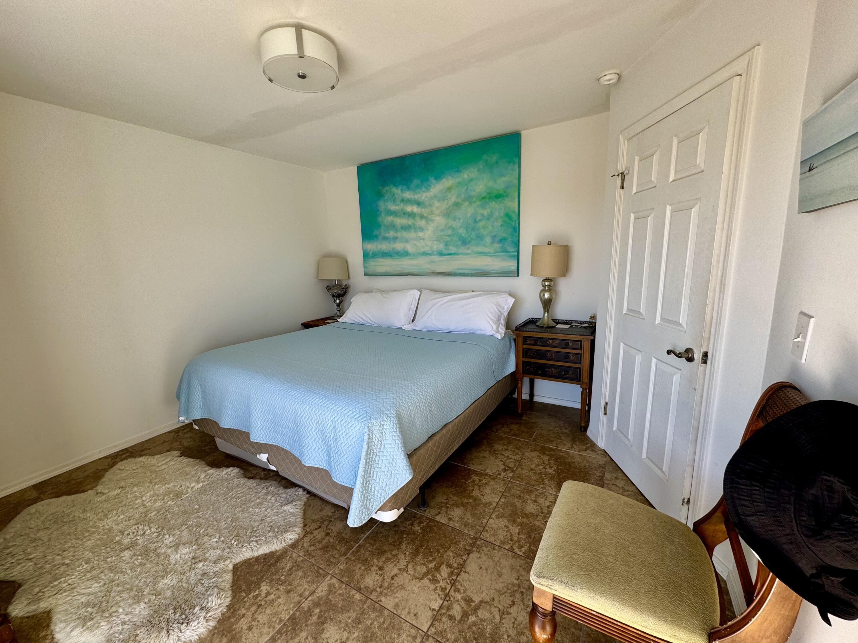 228 Walton Magnolia Lane, Unit 9 Inlet Beach, FL 32461 - Photo 14 of 24 a bedroom with a bed and window