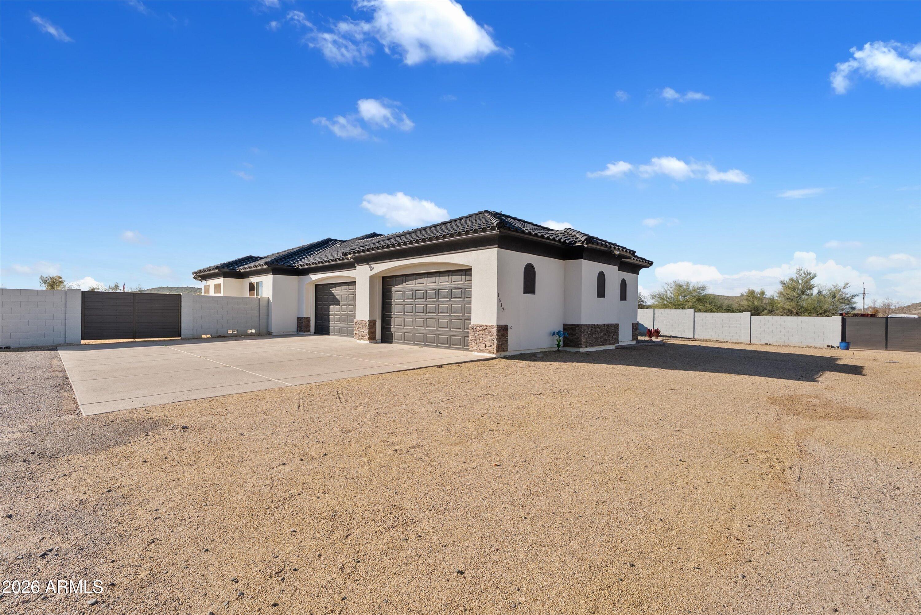 1617 West Maddock Road Phoenix, AZ 85086 - Photo 3 of 50 a view of a house with a outdoor space