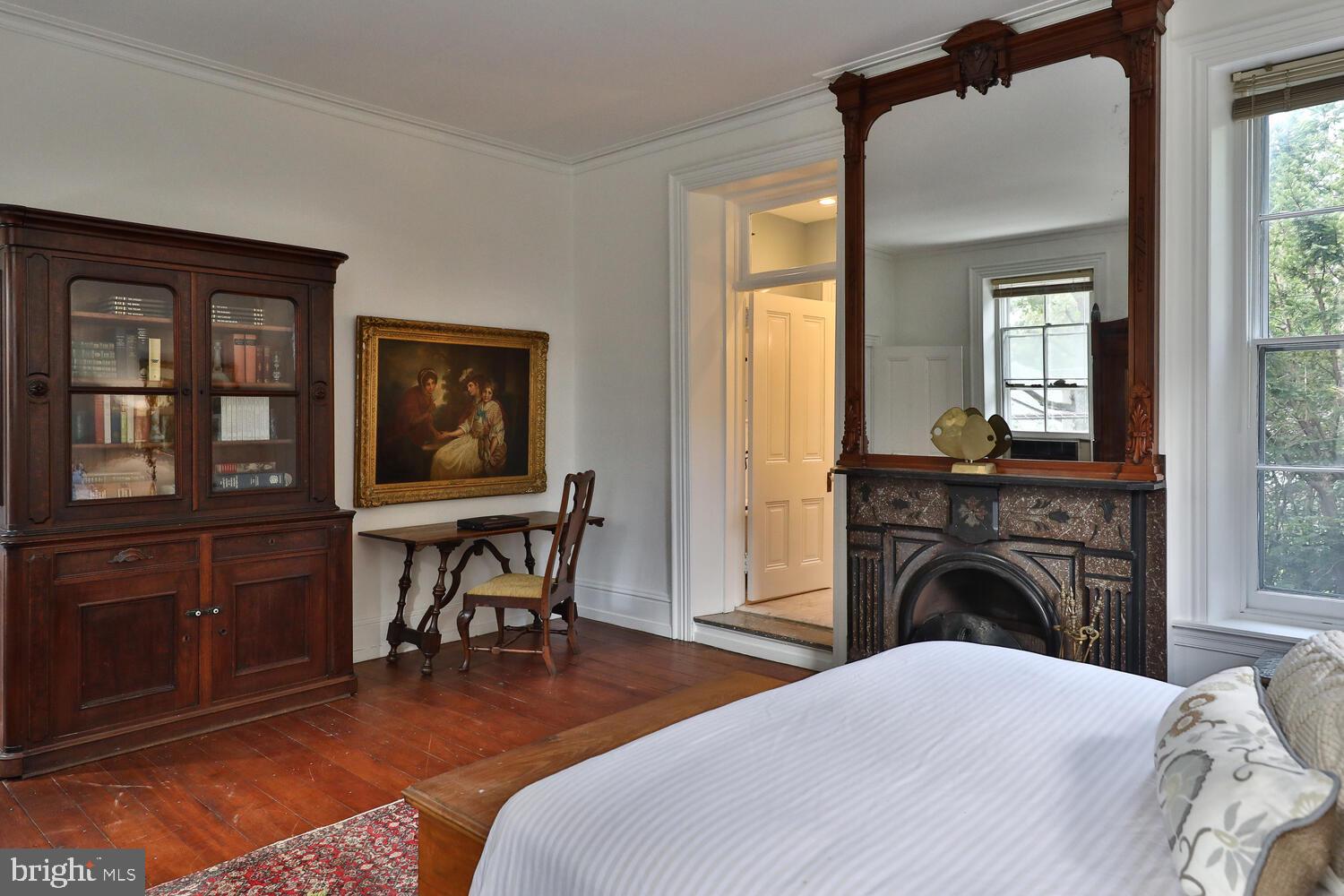 41 South Providence Road Wallingford, PA 19086 - Photo 57 of 92 Primary Bedroom w/ En Suite Bathroom and Fireplace