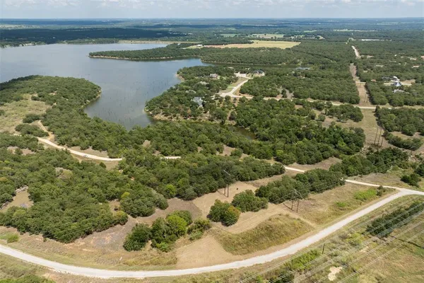 a view of a lake from a yard