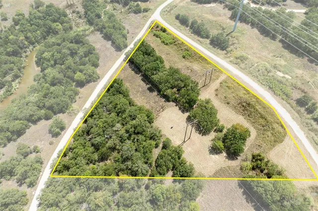 a view of a garden with a lake