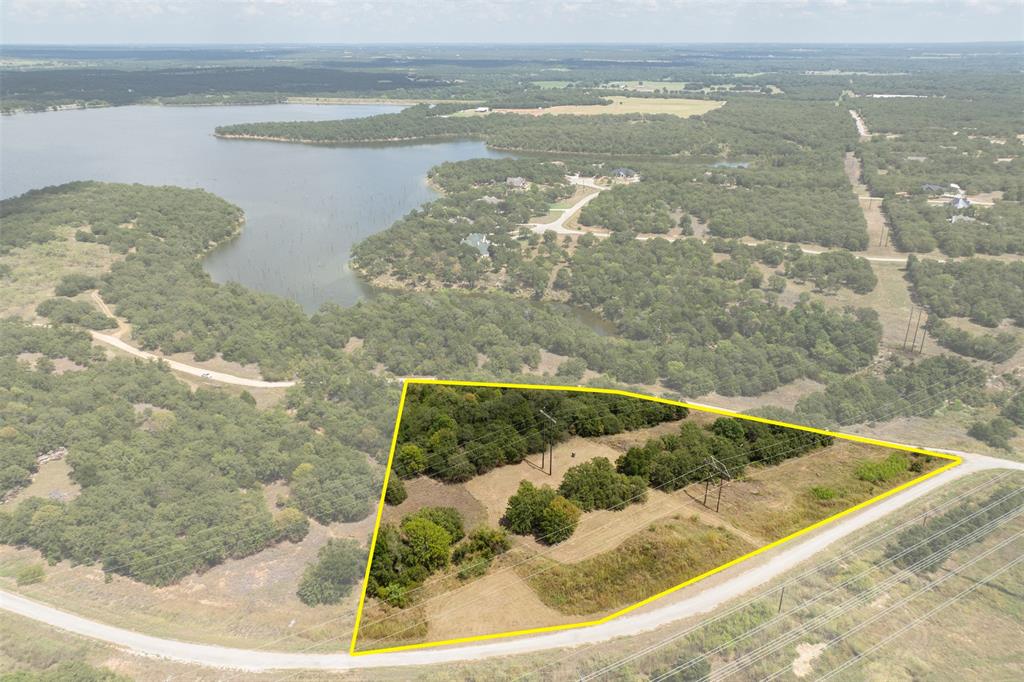 721 Sandstone Court Sunset, TX 76270 - Photo 19 of 19 a view of a lake view