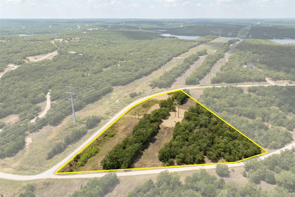 721 Sandstone Court Sunset, TX 76270 - Photo 3 of 19 a view of a lake view