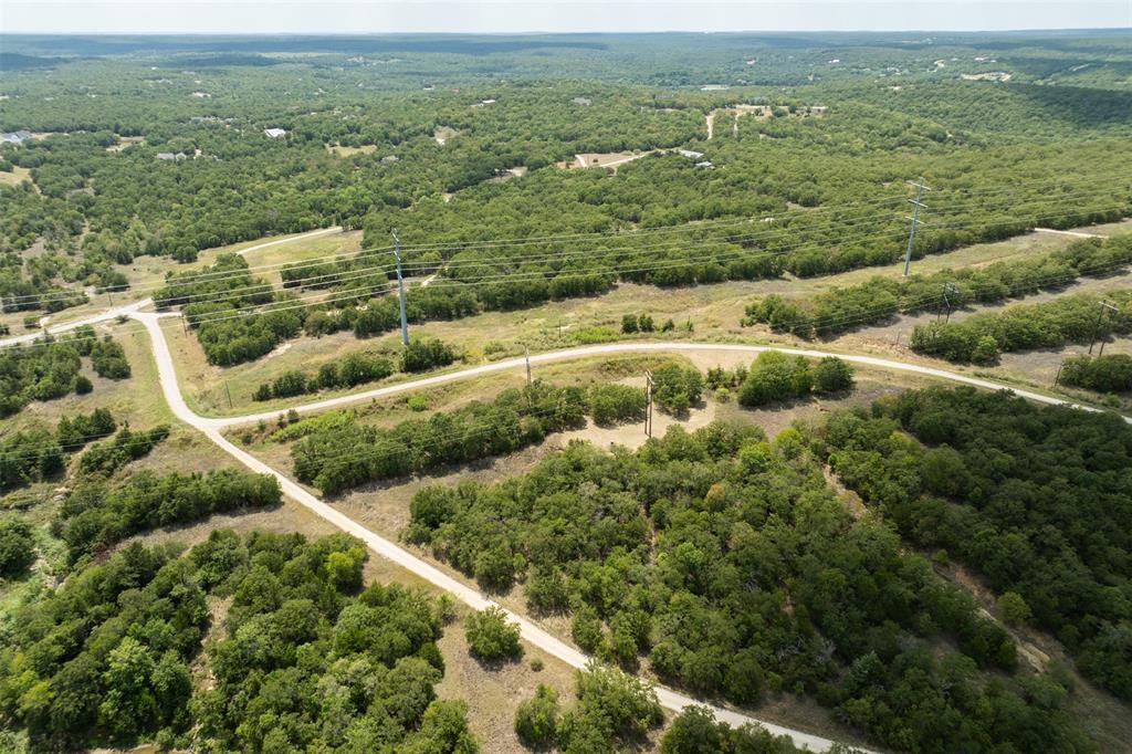 721 Sandstone Court Sunset, TX 76270 - Photo 6 of 19 a view of a field with an ocean