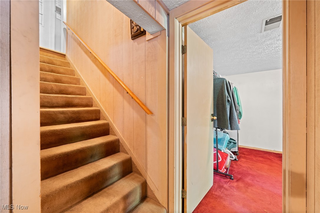 1157 Dussel Road Kent, OH 44240 - Photo 30 of 46 Steps to the lower level w/view of bedroom 6