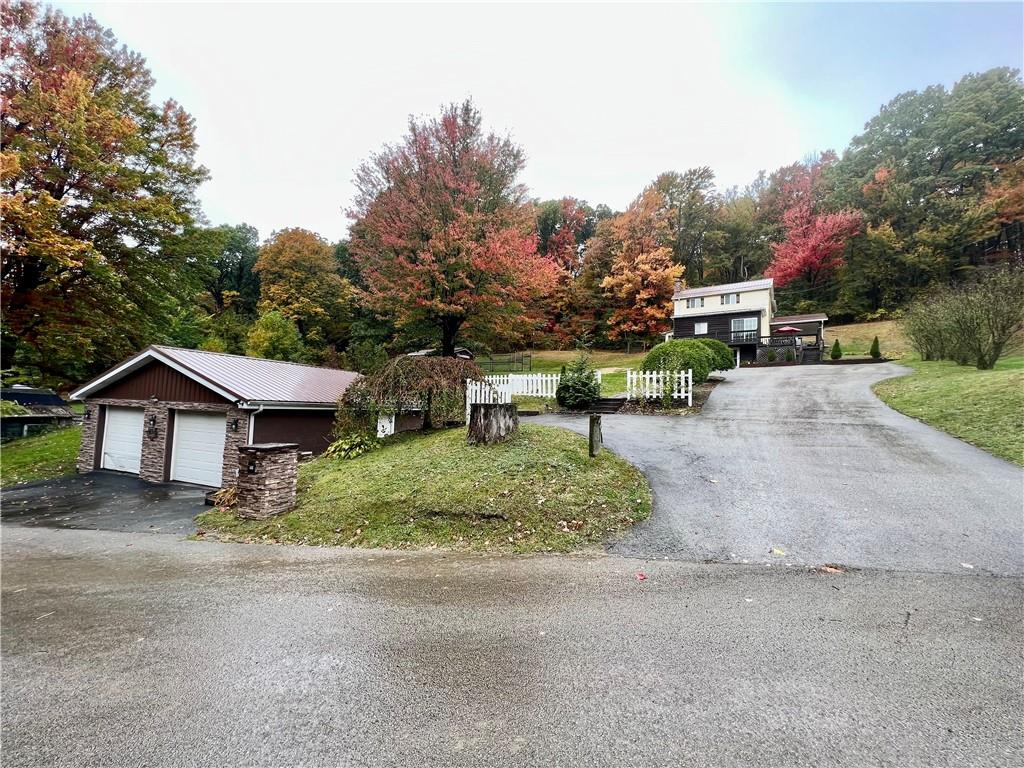 159 Martin Farm Road Dunbar, PA 15431 - Photo 2 of 22 a view of backyard with a garden and entertaining space