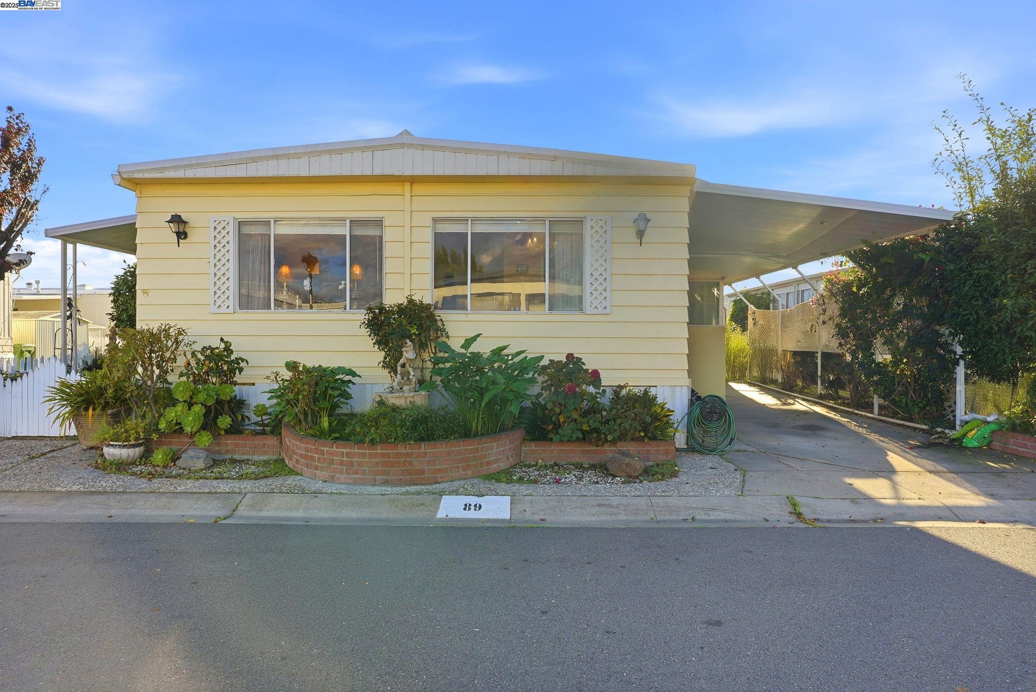 front view of a house with a street