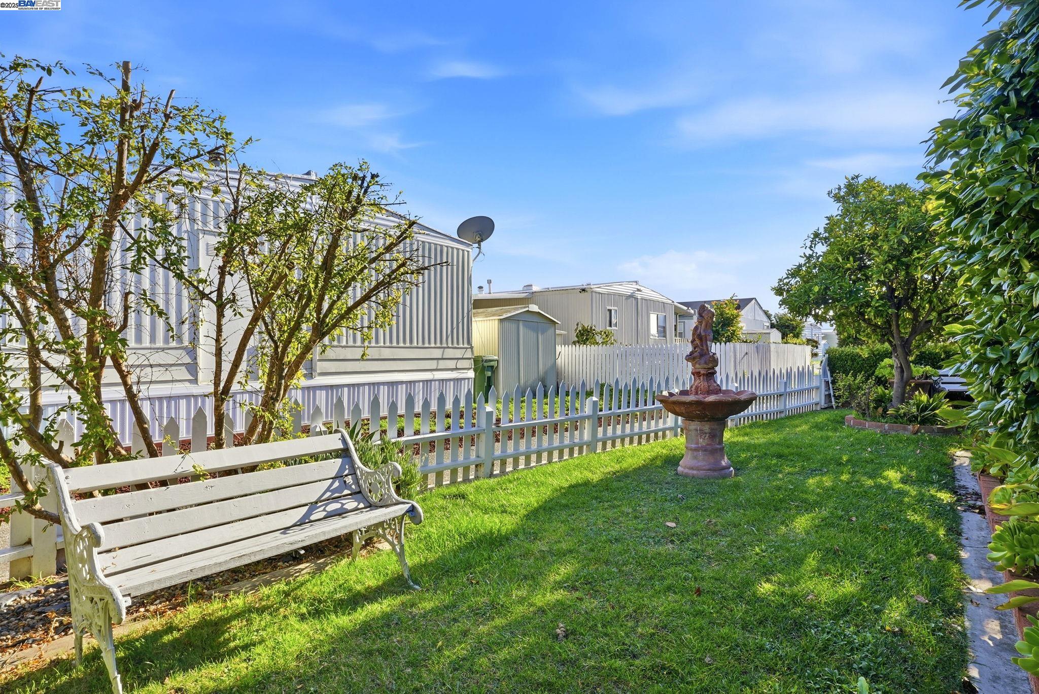 4141 Deep Creek Road, Unit 89 Fremont, CA 94555 - Photo 37 of 54 a view of a house with a yard and sitting area