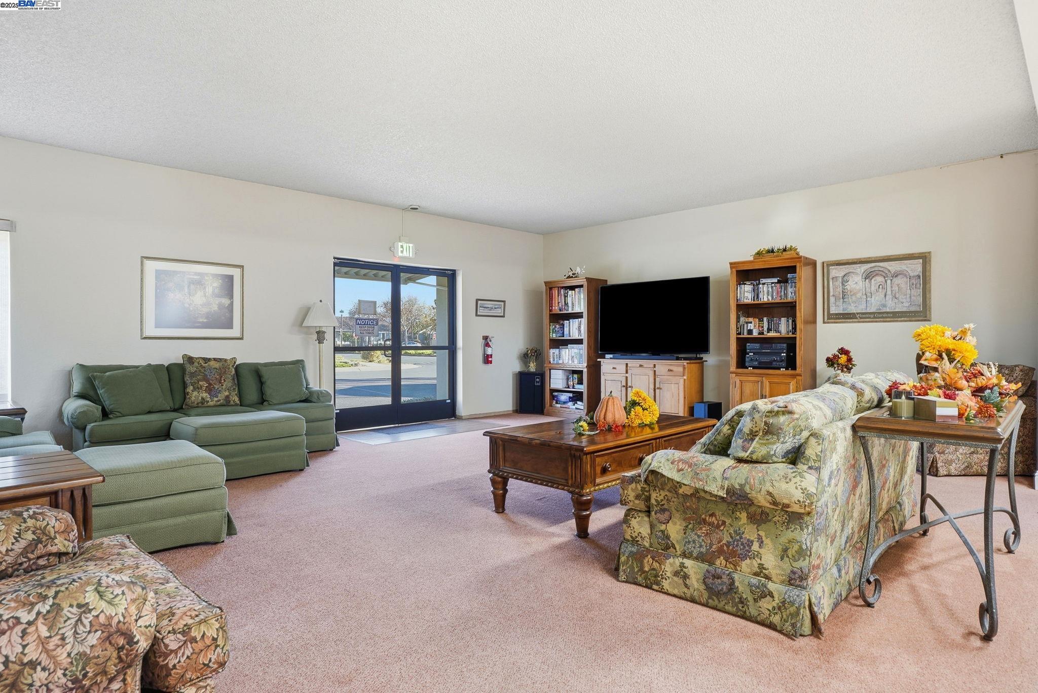 4141 Deep Creek Road, Unit 89 Fremont, CA 94555 - Photo 43 of 54 a living room with furniture and a flat screen tv