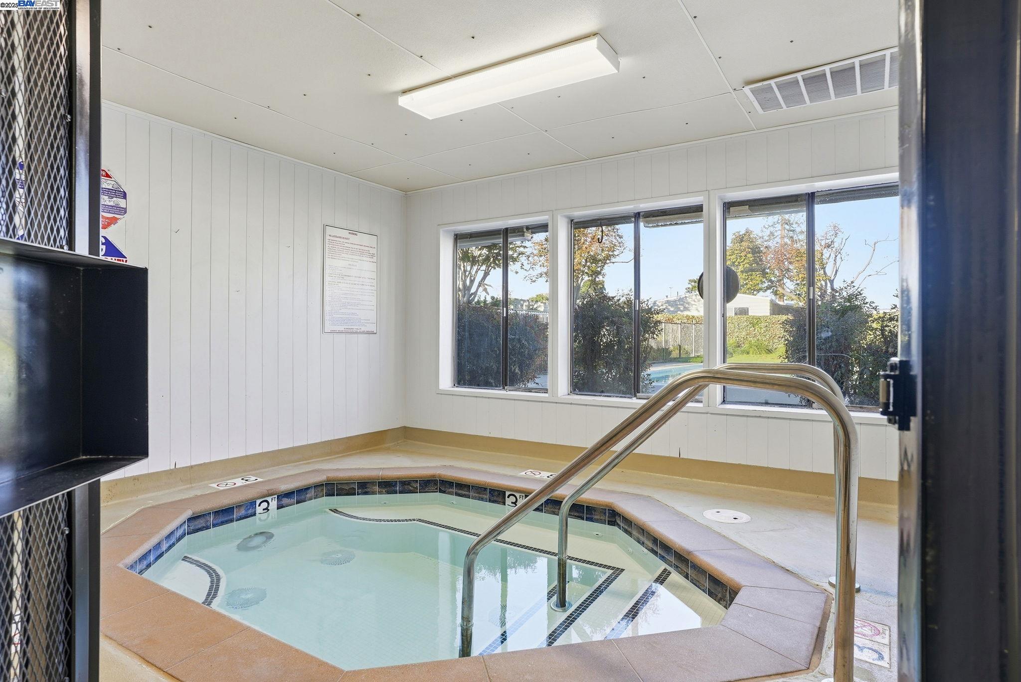 4141 Deep Creek Road, Unit 89 Fremont, CA 94555 - Photo 50 of 54 a view of a living room and floor to ceiling window