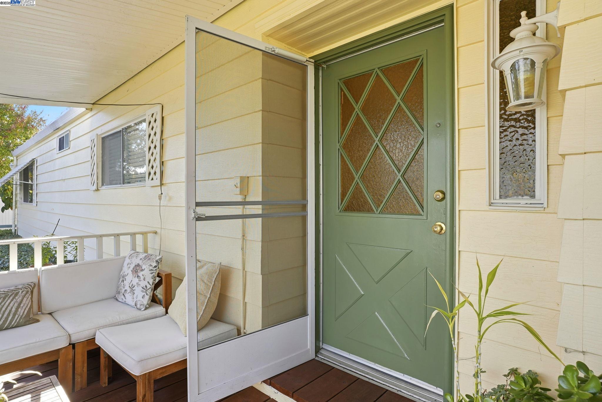 4141 Deep Creek Road, Unit 89 Fremont, CA 94555 - Photo 7 of 54 a view of a door and chair in the patio