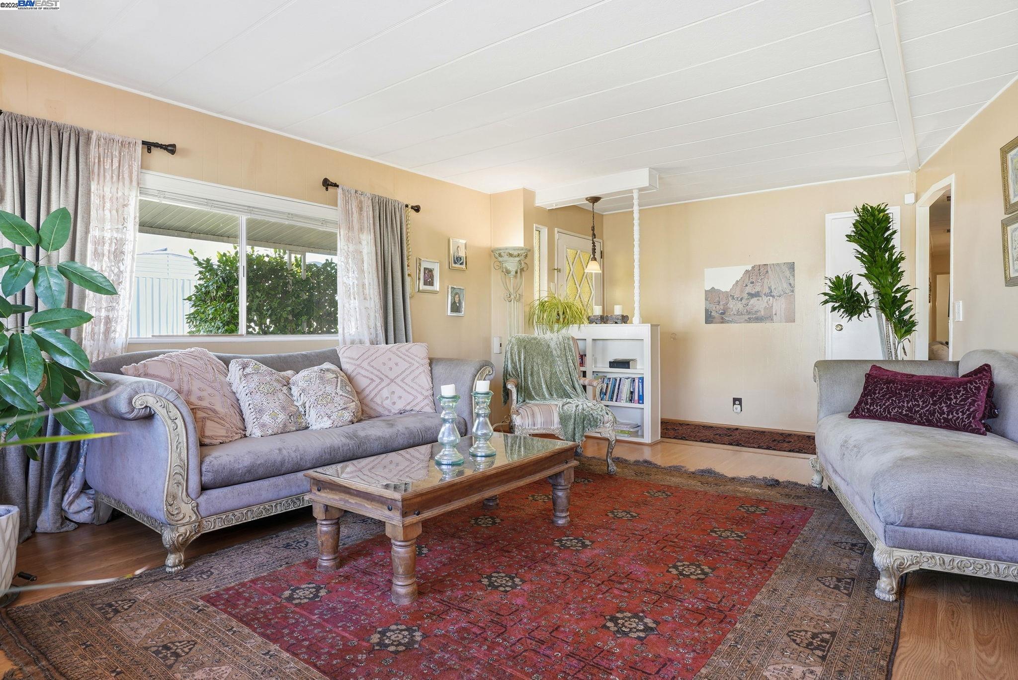 4141 Deep Creek Road, Unit 89 Fremont, CA 94555 - Photo 10 of 54 a living room with furniture and a large window