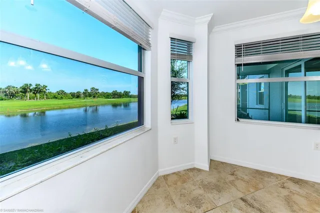 a view of a house with a lake view